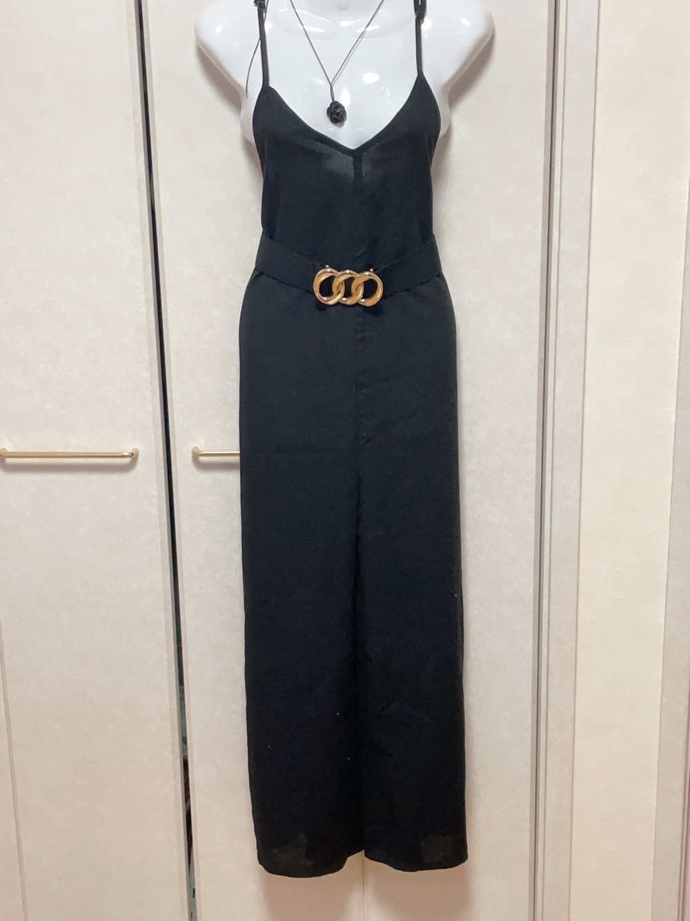Black Spaghetti-Strap Jumpsuit with Gold Triple-Ring Waist Detail